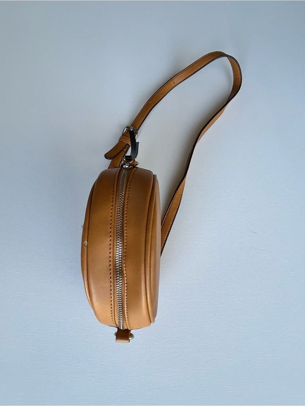Adrienne Vittadini Round Quilted Crossbody Bag in Tan